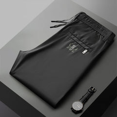 👖Gorąca sprzedaż【Kup 1, otrzymaj 1 gratis】Nowe letnie męskie spodnie z elastycznego jedwabiu [40-115 kg]