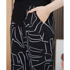 🔥Oferta ograniczona czasowo🔥[S-4XL]Modne obcisłe spodnie z nogawkami wiosna i lato casual duży rozmiar【45-95kg】
